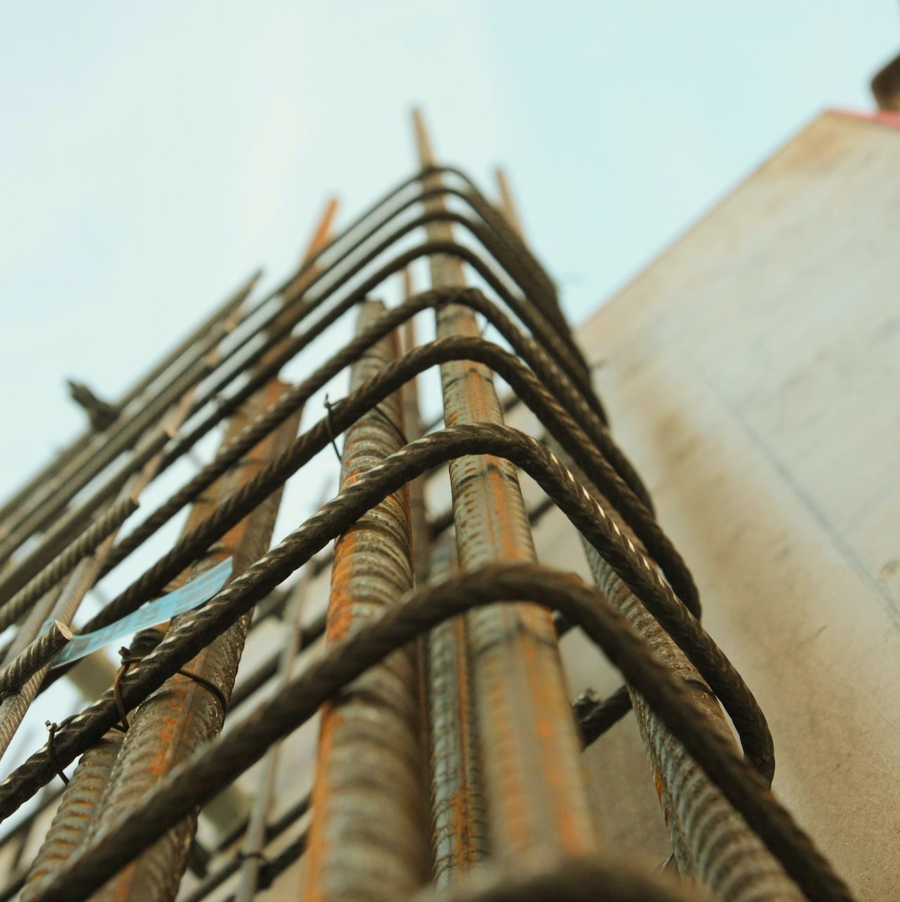 worm's-eye view photography of rebar