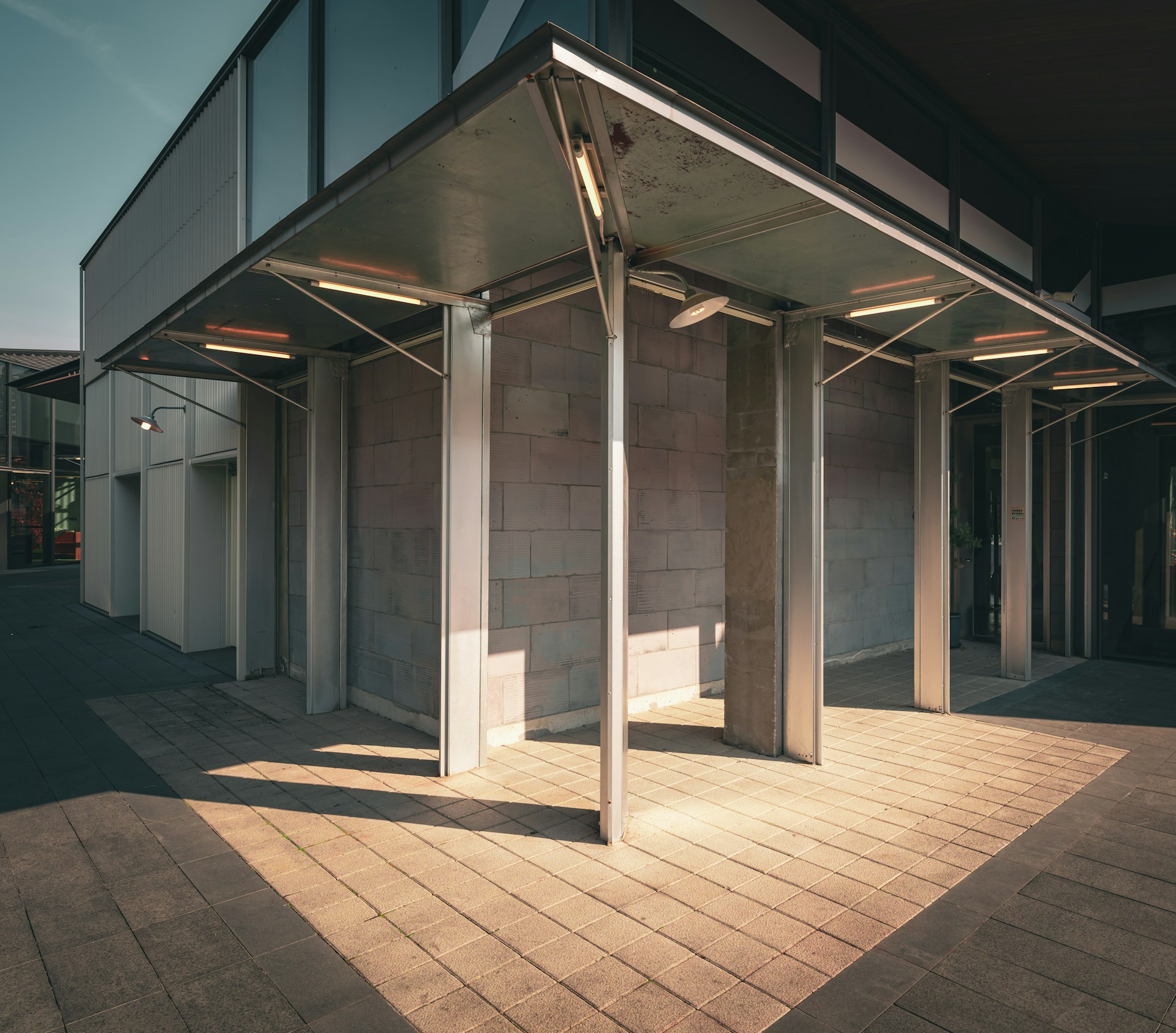 An empty parking lot in front of a building